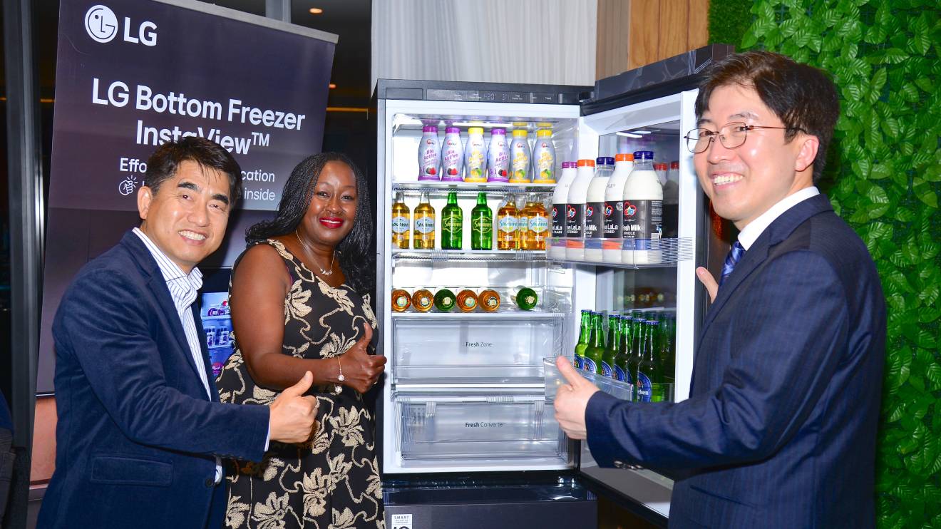 L-R) LG Electronics East Africa President, Donghun Lee; Head of Marketing, Jane Kariuki; and Home Solutions Product Director, KH Jeong during the launch of the new LG InstaView Bottom Freezer Refrigerator. PHOTO/COURTESY